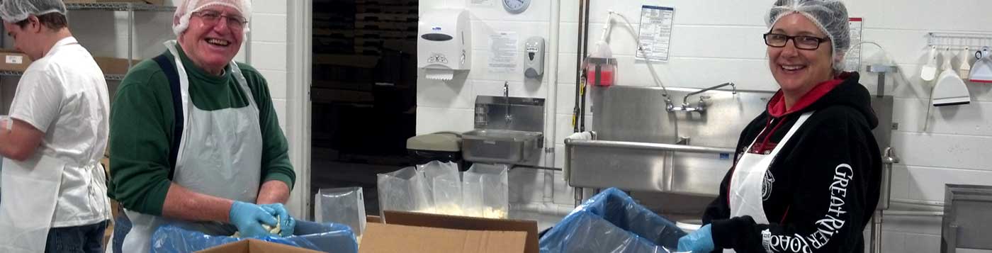 Two factory workers at a local creamery in western Wisconsin.